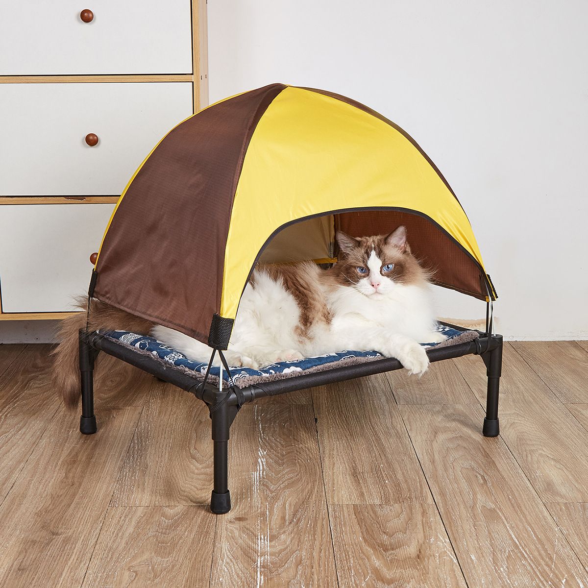 Yellow Elevated Pet Cot with Canopy and Plush Mat shown in the product image
