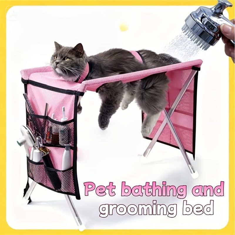 Foldable Pet Grooming Table for Cats and Small Dogs, Multi-functional Care Station with Mesh Bed, Storage Pockets, and Adjustable Restraint Straps for Nail Trimming, Hair Brushing, Bathing, and Ear Cleaning (Pink)